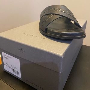 Flat black sandals